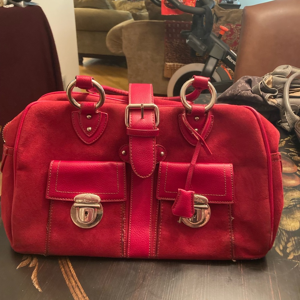 Red handbag with silver color hardware